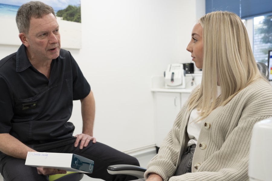 Dr Simon O'Neill with patient