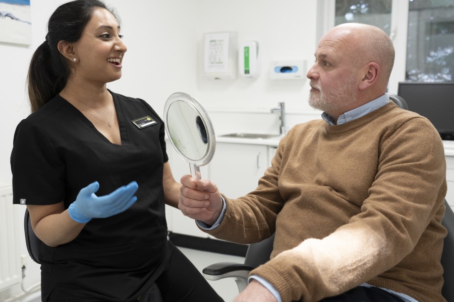 Sophina Kang Dental Hygienist with patient